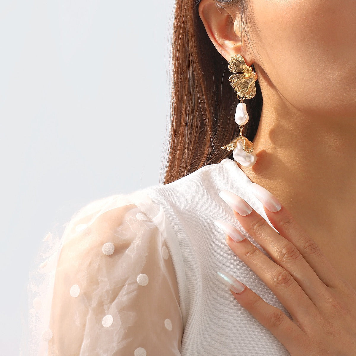 Shaped pearl earrings, metal wind leaves, exaggerated trendsetter earrings, geometric irregular earrings