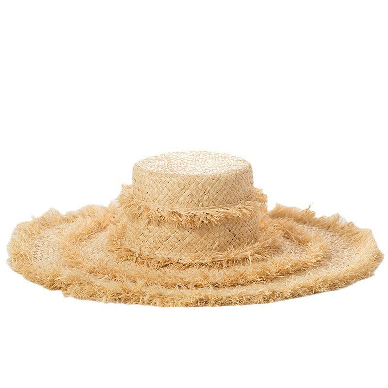 Grass woven tassel decoration, hand woven large eave flat top Lafite straw hat, sun protection, sun shading, beach fur brim straw hat