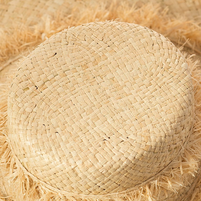 Grass woven tassel decoration, hand woven large eave flat top Lafite straw hat, sun protection, sun shading, beach fur brim straw hat