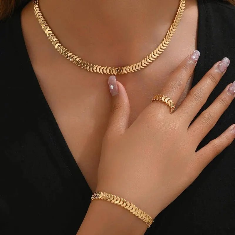 Elegant Fishbone Jewelry Set - Necklace, Bracelet, and Ring in Stainless Steel and Copper
