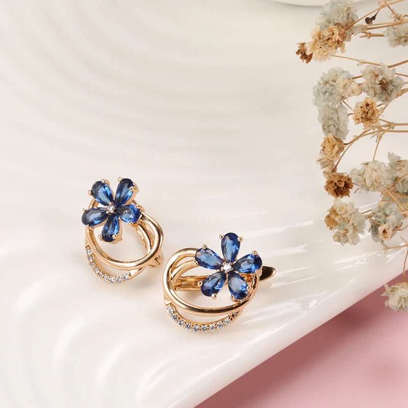 Gold Floral Earrings for Women with Blue Zircon Crystals – Elegant Five-Petal Design