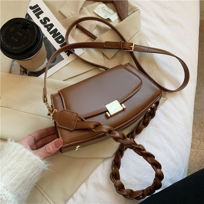 Twist Strap Shoulder Bag