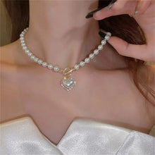 Load image into Gallery viewer, Pearl Heart Clasp Choker Necklace for Women – Elegant Faux Pearl Jewelry with Rhinestone Accents
