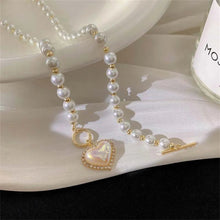 Load image into Gallery viewer, Pearl Heart Clasp Choker Necklace for Women – Elegant Faux Pearl Jewelry with Rhinestone Accents
