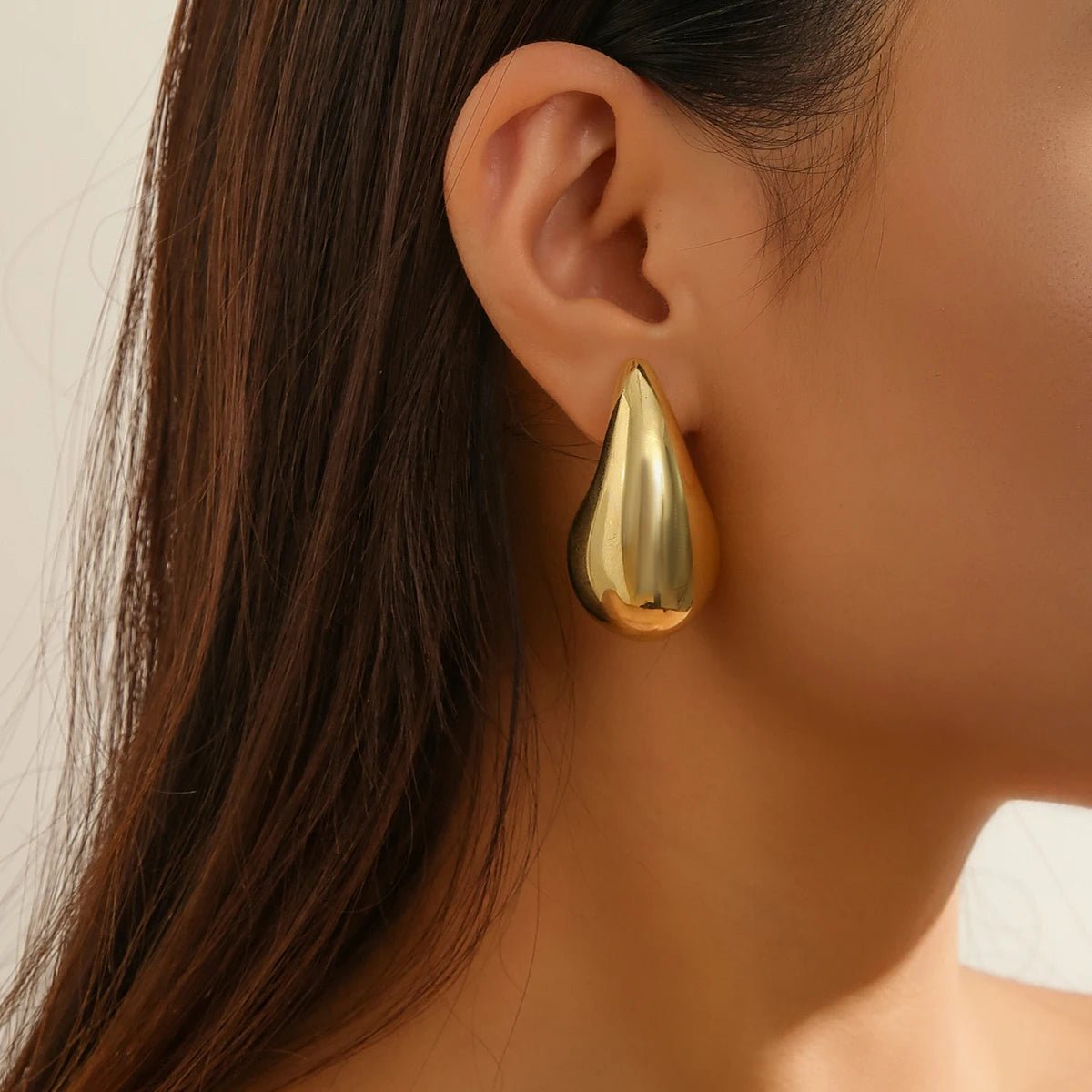 Statement Water Drop Earrings in Gold and Silver – Minimalist Stud Design