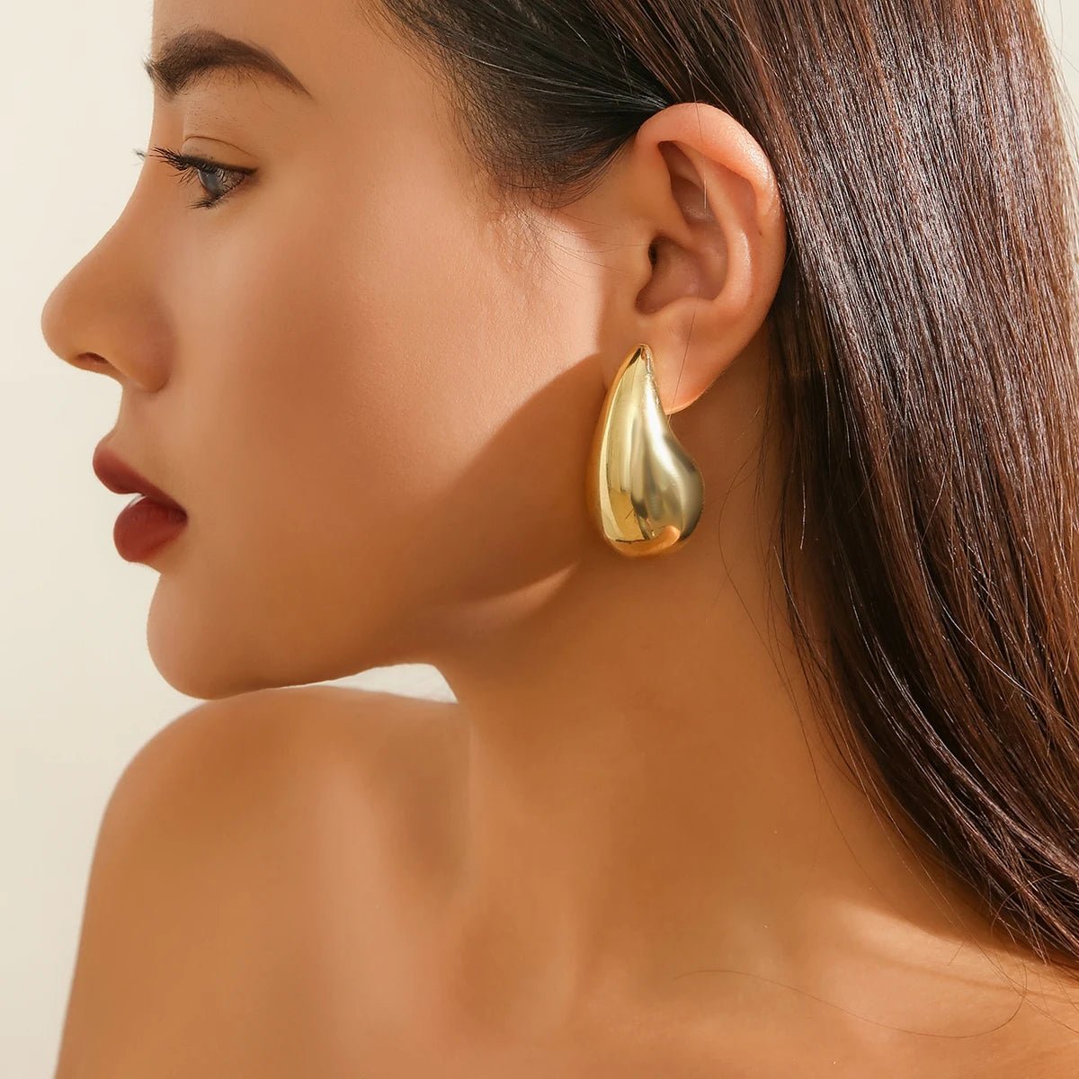 Statement Water Drop Earrings in Gold and Silver – Minimalist Stud Design